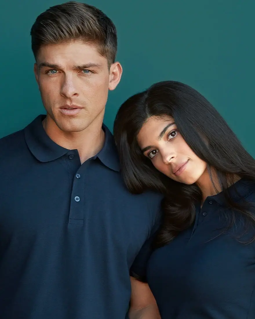 Two people in polo shirts from the official Stedman collection