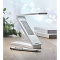 18 LED foldable desktop lamp in ABS with weather station. Displays time, temperature.