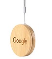 A set of charging cables in a bamboo box, a key ring