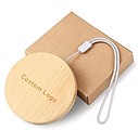 A set of charging cables in a bamboo box, a key ring