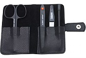A small manicure in a leather case with a zipper