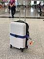 Adjustable luggage strap