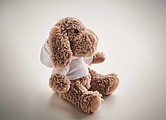 Dog plush wearing a hoodie