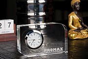 Glass block with small clock, transparent