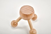 Hand held massager in wood