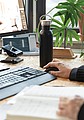 Modern stainless steel bottle with bamboo lid, black
