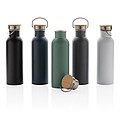 Modern stainless steel bottle with bamboo lid, green
