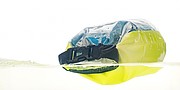 Polyester (210T) watertight bag with PVC phone pouch and plastic closure.