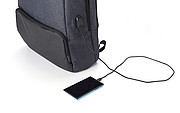 PVC backpack with anti-theft back pocket.