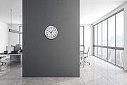 Round media clock made of metal, white