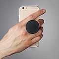 Round shaped foldable phone accessory in ABS with two functions: phone stand and holder.