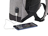 Two-tone polyester (600D) anti-theft backpack, with PVC backing.