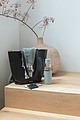 Ukiyo glass hydration tracking bottle with sleeve