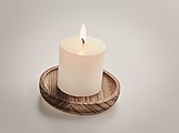 Wooden plate with candle