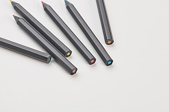 6 black colouring pencils, black