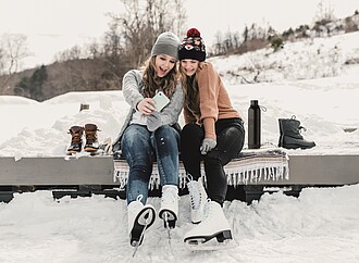 Double wall vacuum insulating bottle