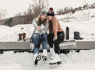 Double wall vacuum insulating bottle