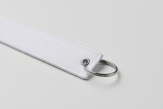 Remove before flight key ring, white