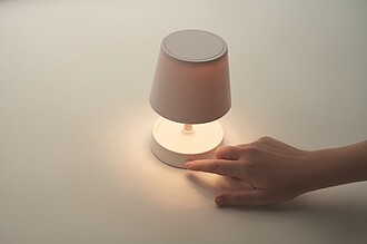 Retractable and rechargeable USB table lamp