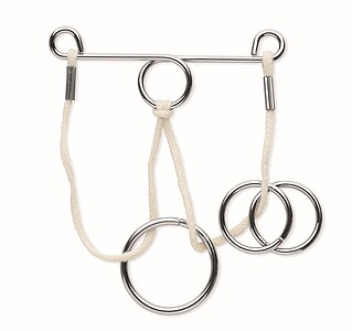 Set of 2 metal, wood and cotton cord brain teasers